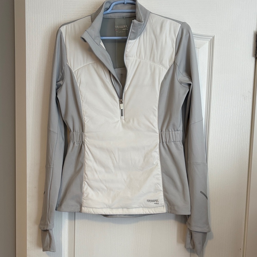 Running Room jacket, gray ans white. Excellent condition. Smoke free home.